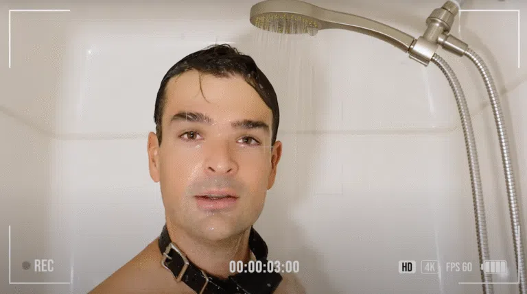 Zach in the shower wearing the PetSafe Guardian